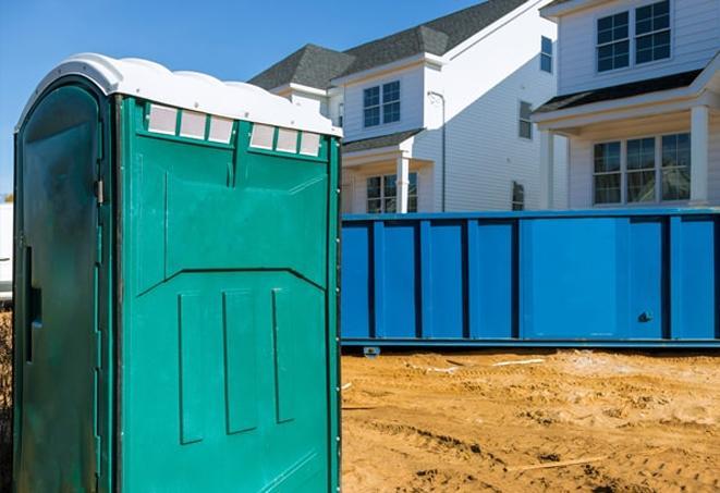 a sea of porta potties at a job site